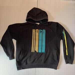 Roco wear black hoodie with yellow and blue accents